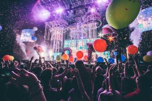 people standing in front of stage